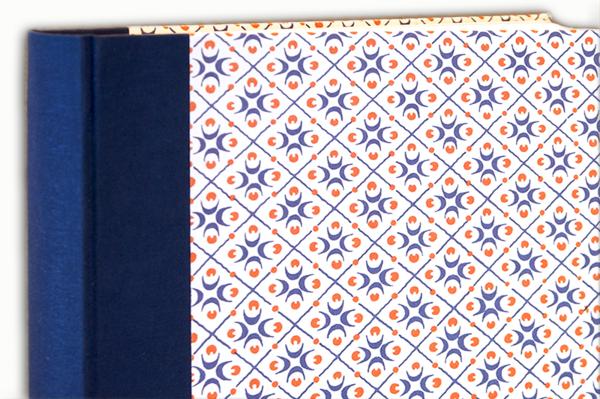 Photo album, linen spine blue, cover small geometric pattern, dots, diamonds blue, red